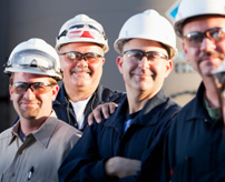 Four Men Wearing Construction Hats Four Men Wearing Construction Hats